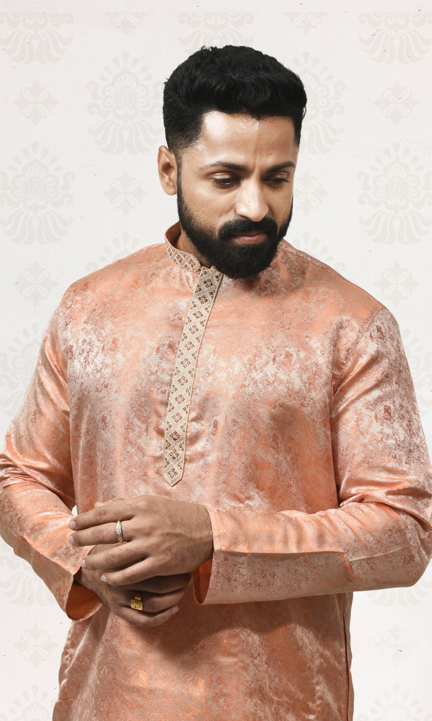 Silken Blush Orange Kurta with Royal Embossed Detailing