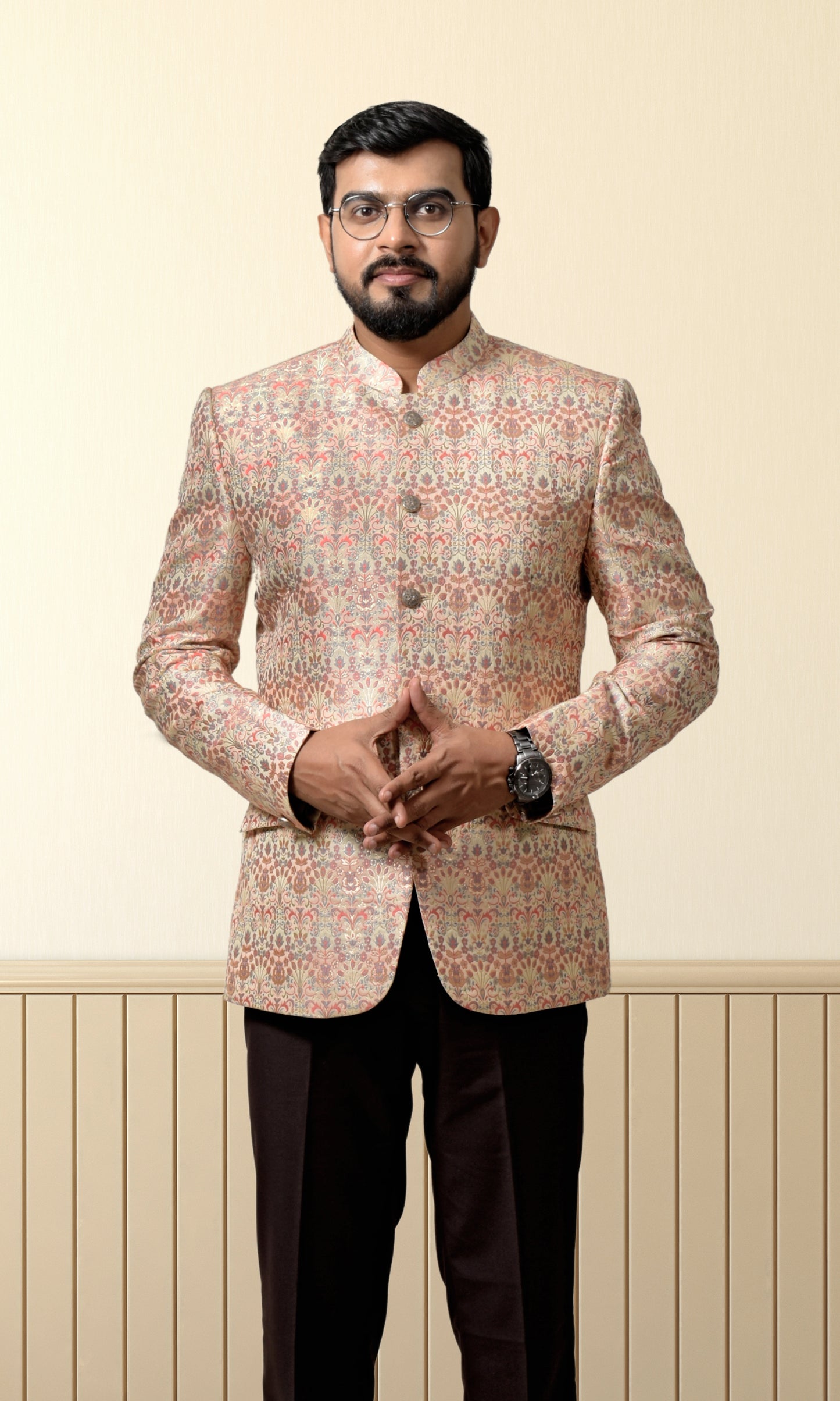 Luxurious cream bandhgala adorned with vintage-inspired floral patterns