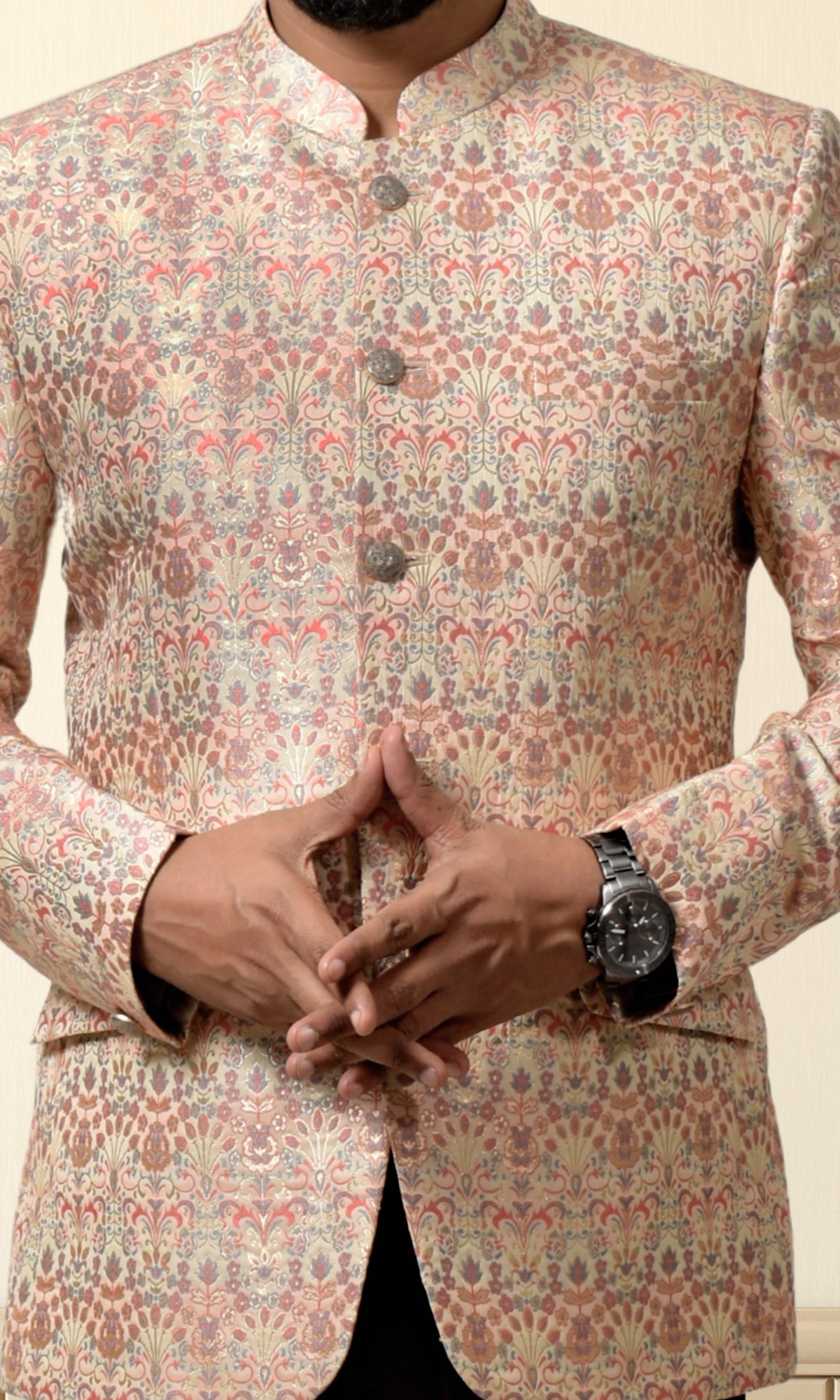 Luxurious cream bandhgala adorned with vintage-inspired floral patterns