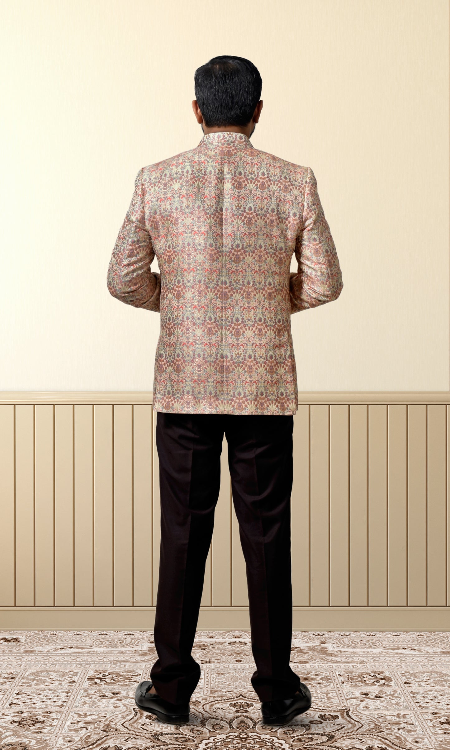 Luxurious cream bandhgala adorned with vintage-inspired floral patterns