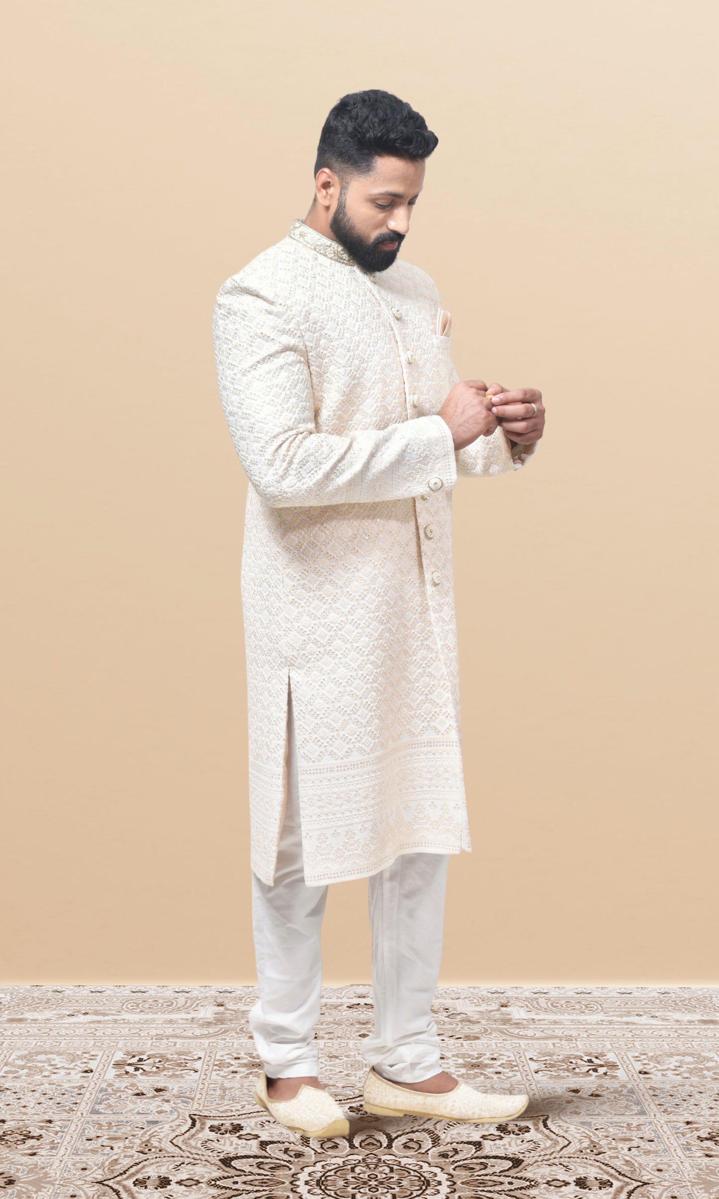 Regal Ivory Georgette Brocade Sherwani with Ornate Zari Weaving & Handcrafted Buttons