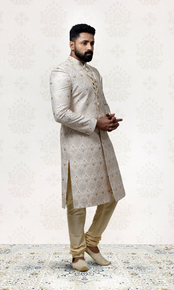 Antique Gold Sherwani with Intricate Embroidery, Jewel Buttons & Embellished Neckline