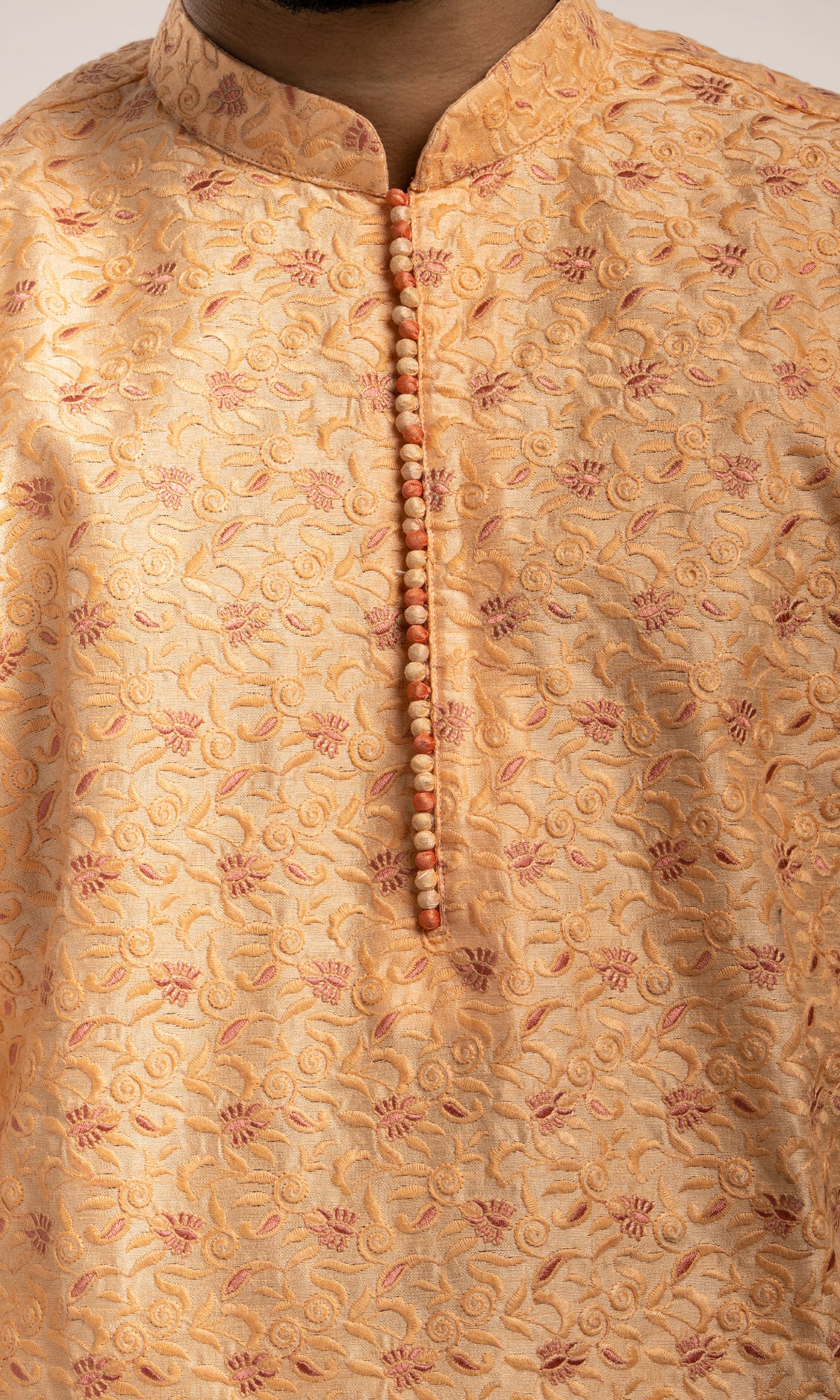 CREAMY PEACH EMBROIDERED SILK KURTA WITH POTLI BUTTONS