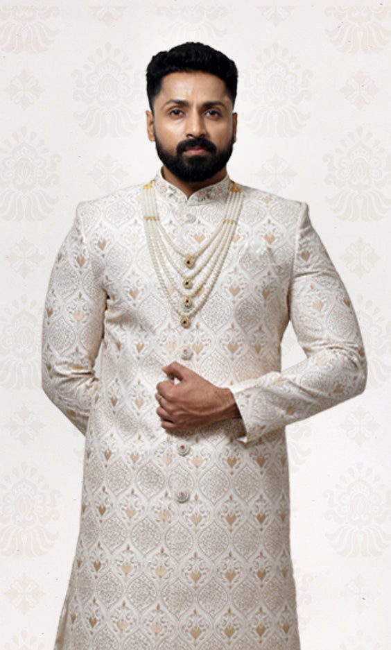 Antique Gold Sherwani with Intricate Embroidery, Jewel Buttons & Embellished Neckline