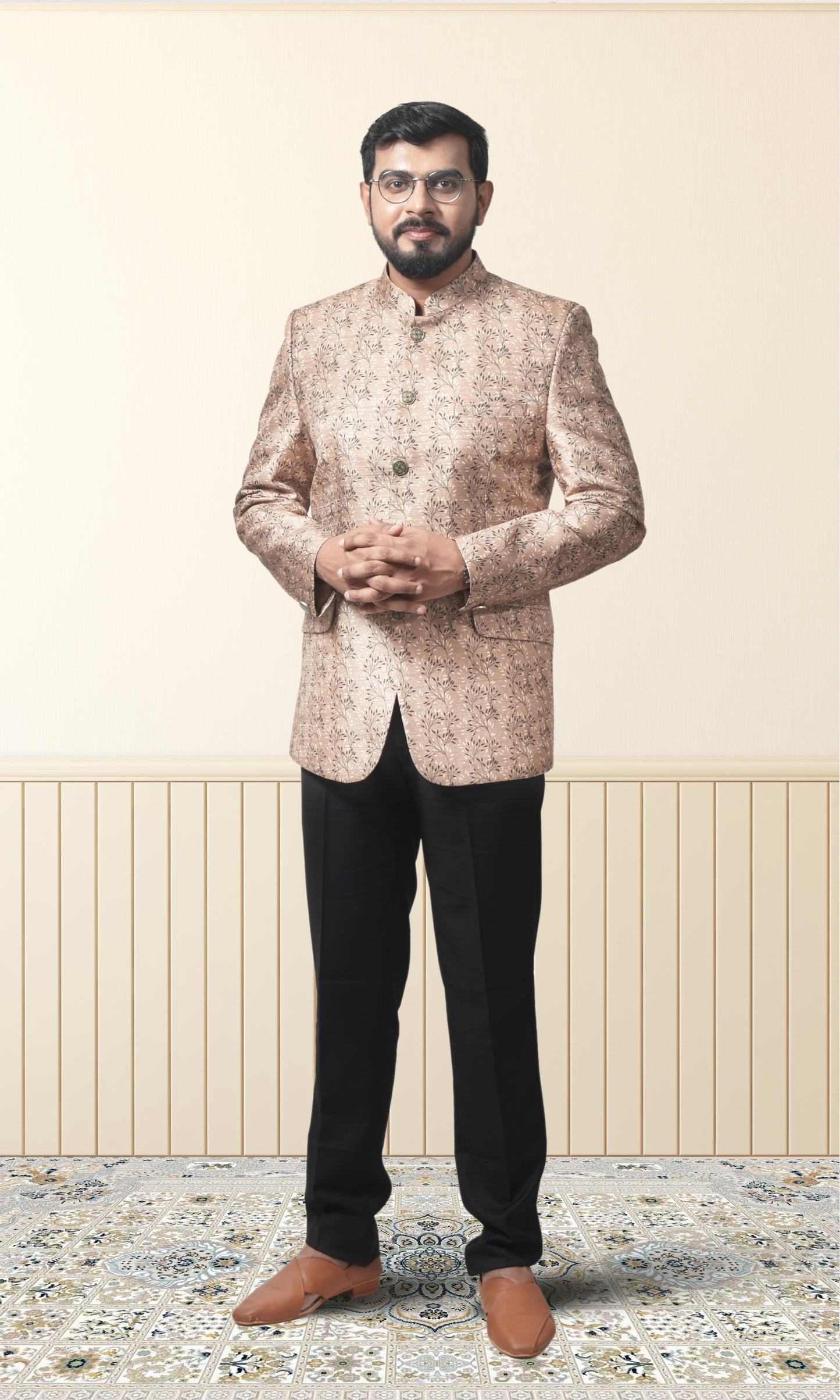 Regal beige bandhgala with intricate floral motifs and gold accents