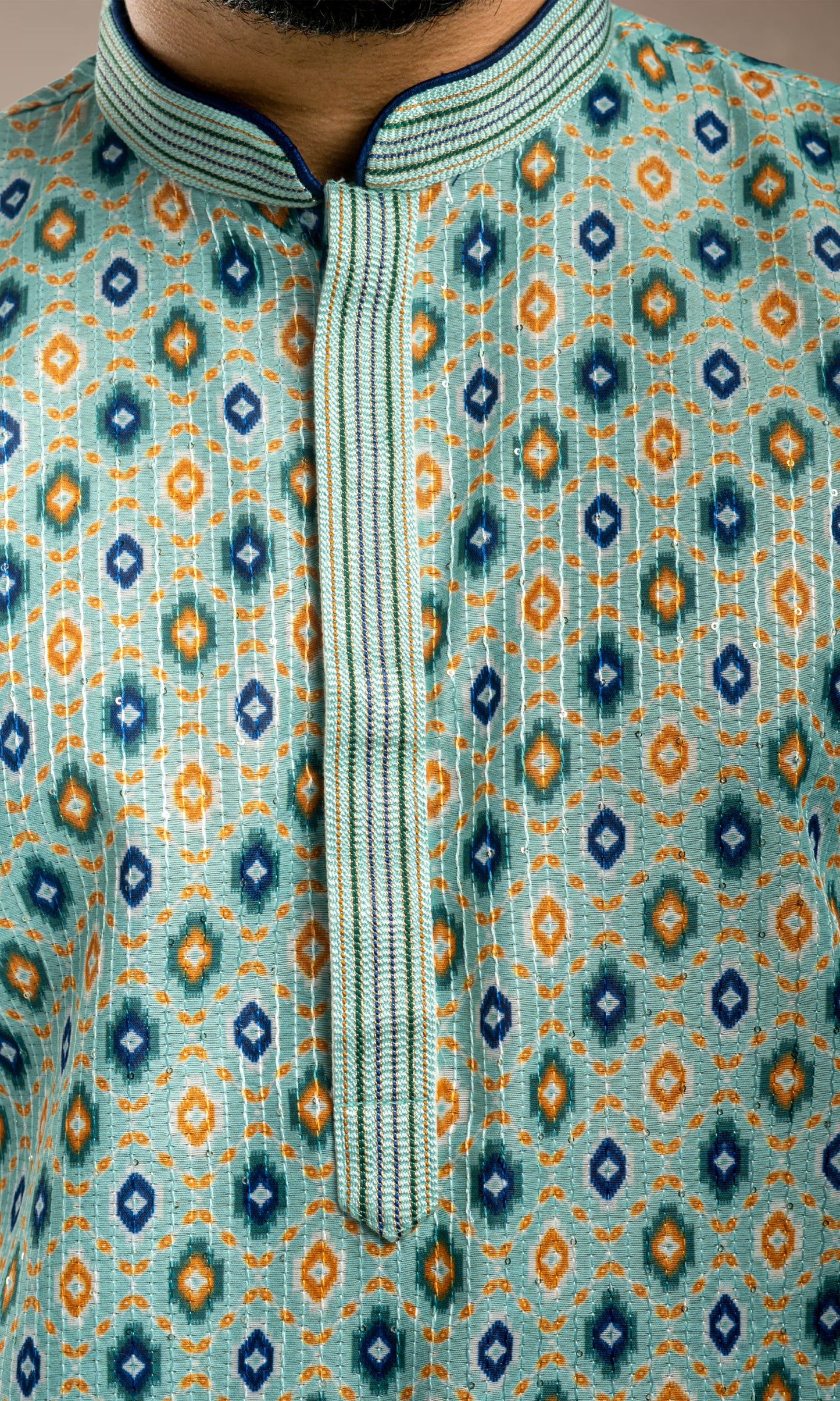 AQUA BLUE IKKAT PRINT KURTA WITH SEQUINED THREAD WORK