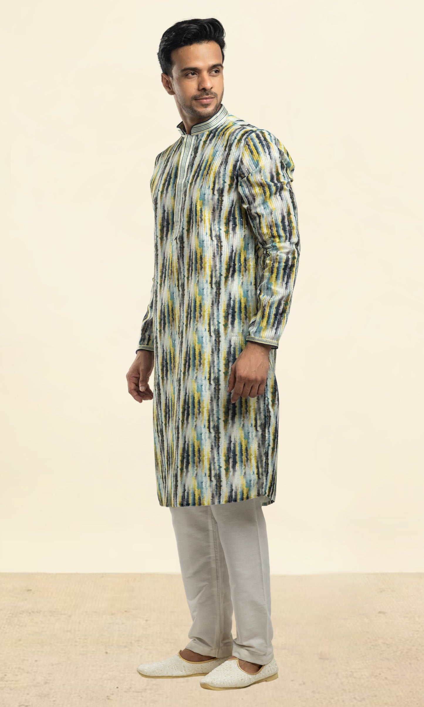 NAVY WITH HALDI COLOUR ABSTRACT PRINT KURTA WITH SEQIUNED THREADWORK